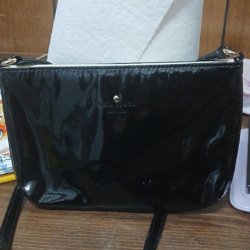 Kate Spade New York Harrison Street Tay Patent Leather Crossbody Bag.